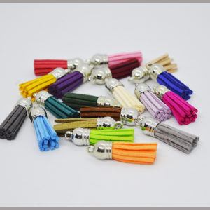 Pompon décoratif en faux suède